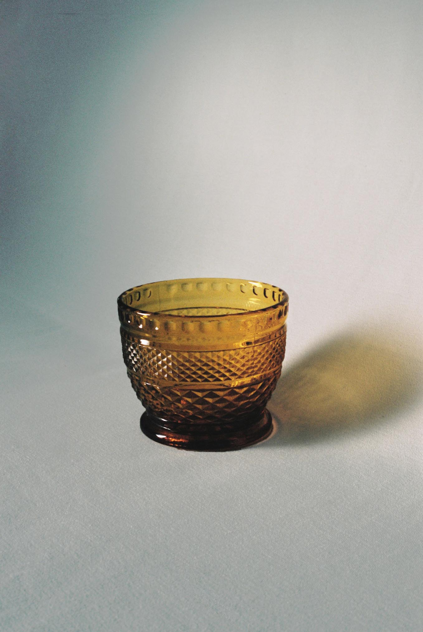 KIG Diamond Point Amber Bowl available for prop hire in Cape Town